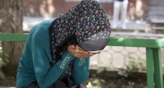 Crying woman, Grozny. Photo: RFE/RL Crying woman, Grozny. Photo: RFE/RL