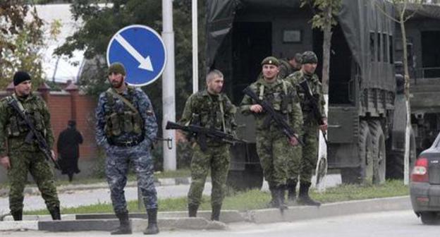 Law enforcers. Photo: REUTERS/Alkhan Gargayev Law enforcers. Photo: REUTERS/Alkhan Gargayev