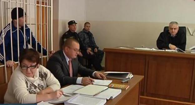 In the courtroom during the hearing in Ruslan Rakhaev's case. Cherkessk, screenshot of the video broadcasted by the "Cherkessk" TV channel https://www.youtube.com/watch?v=8rGcvijEpUA In the courtroom during the hearing in Ruslan Rakhaev's case. Cherkessk, screenshot of the video broadcasted by the "Cherkessk" TV channel https://www.youtube.com/watch?v=8rGcvijEpUA