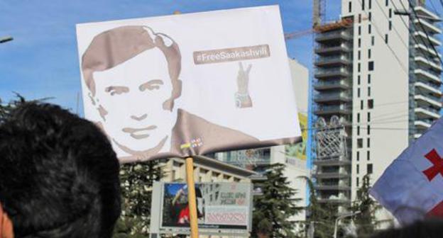 A poster of the participants of the action organized by the "United National Movement" Party. December 11, 2017. Photo by Inna Kukudjanova for the "Caucasian Knot" A poster of the participants of the action organized by the "United National Movement" Party. December 11, 2017. Photo by Inna Kukudjanova for the "Caucasian Knot"