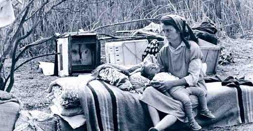 The internally displaced Azerbaijani residents from Karabakh. 1993. Photo: Oleg Litvin https://ru.wikipedia.org The internally displaced Azerbaijani residents from Karabakh. 1993. Photo: Oleg Litvin https://ru.wikipedia.org