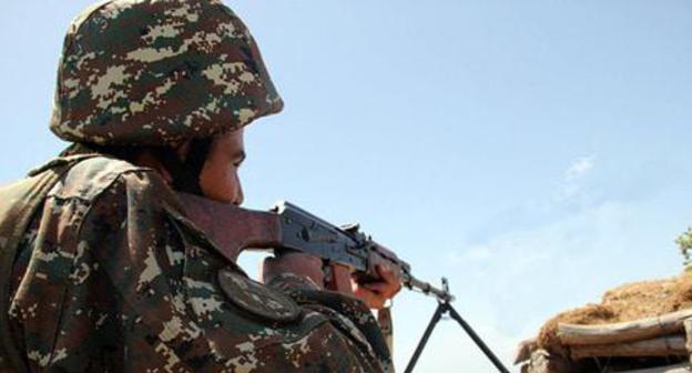 An Armenian soldier in combat position. Photo: © Sputnik/ David Galstyan An Armenian soldier in combat position. Photo: © Sputnik/ David Galstyan