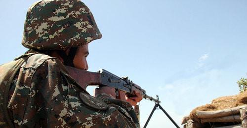 An Armenian soldier in combat position. Photo: © Sputnik/ David Galstyan An Armenian soldier in combat position. Photo: © Sputnik/ David Galstyan