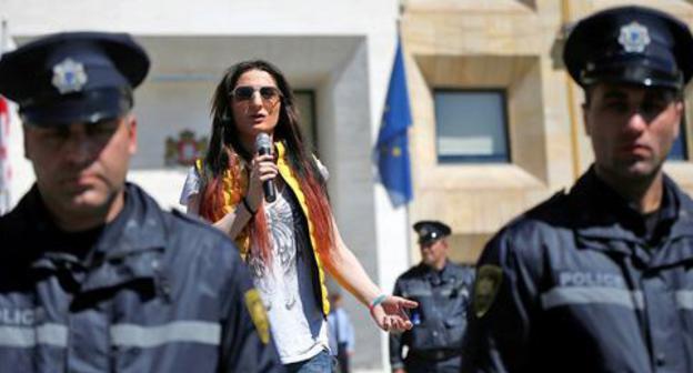 LGBT activist surrounded by policemen delivers speech, Tbilisi, May 2017. Photo: REUTERS/David Mdzinarishvili LGBT activist surrounded by policemen delivers speech, Tbilisi, May 2017. Photo: REUTERS/David Mdzinarishvili