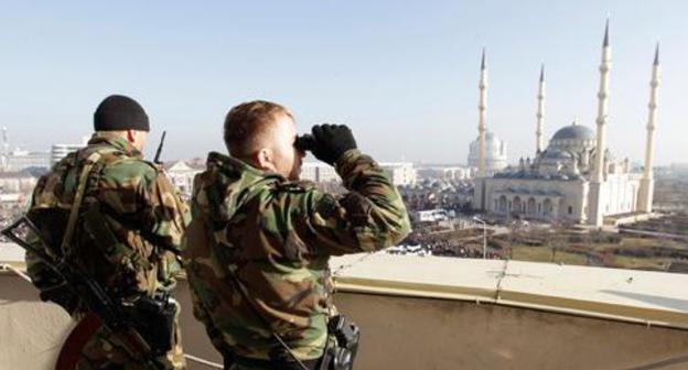 Law enforcers, Grozny. Photo: REUTERS/Eduard Korniyenko Law enforcers, Grozny. Photo: REUTERS/Eduard Korniyenko