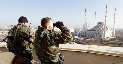 Law enforcers, Grozny. Photo: REUTERS/Eduard Korniyenko Law enforcers, Grozny. Photo: REUTERS/Eduard Korniyenko