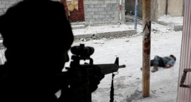A shooter. Iraq. Photo: REUTERS/Goran Tomasevic A shooter. Iraq. Photo: REUTERS/Goran Tomasevic