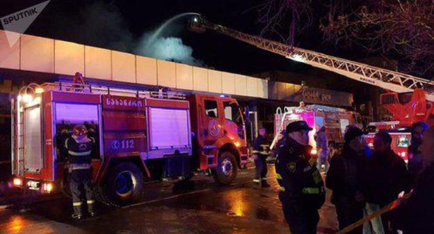 Fire at 'Tergi' market. Photo: © Sputnik / Alexander Imedashvili https://sputnik-georgia.ru/incidents/20180227/239466325/V-centre-Tbilisi-gorit-rynok-dlja-tushenija-mobilizovano-35-mashin.html Fire at 'Tergi' market. Photo: © Sputnik / Alexander Imedashvili https://sputnik-georgia.ru/incidents/20180227/239466325/V-centre-Tbilisi-gorit-rynok-dlja-tushenija-mobilizovano-35-mashin.html
