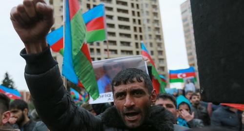 A participant of the opposition rally in Baku on March 10, 2018. Photo by Aziz Karimov for the "Caucasian Knot" A participant of the opposition rally in Baku on March 10, 2018. Photo by Aziz Karimov for the "Caucasian Knot"