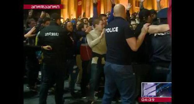 The police officers and protesters in Tbilisi. May 12, 2018. Screenshot of the report by the Rustavi TV Channel http://rustavi2.ge/en/news/103763 The police officers and protesters in Tbilisi. May 12, 2018. Screenshot of the report by the Rustavi TV Channel http://rustavi2.ge/en/news/103763