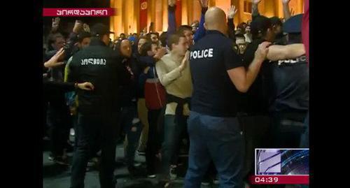 The police officers and protesters in Tbilisi. May 12, 2018. Screenshot of the report by the Rustavi TV Channel http://rustavi2.ge/en/news/103763 The police officers and protesters in Tbilisi. May 12, 2018. Screenshot of the report by the Rustavi TV Channel http://rustavi2.ge/en/news/103763