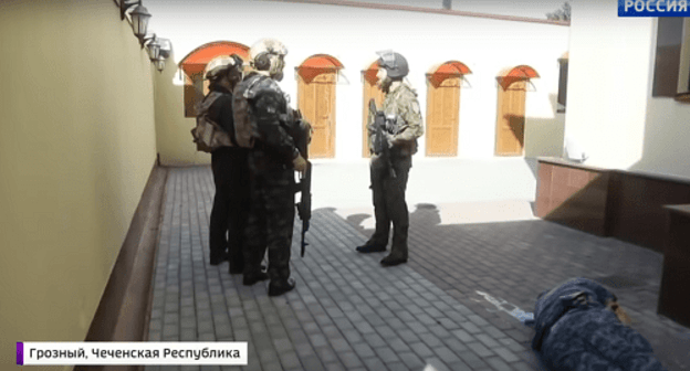 Law enforcers at the Archangel Michael Church. Screenshot from video reportage by Russia-1 Channel https://www.youtube.com/watch?v=hVMhdeHJlyc Law enforcers at the Archangel Michael Church. Screenshot from video reportage by Russia-1 Channel https://www.youtube.com/watch?v=hVMhdeHJlyc