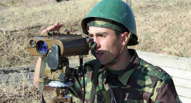 A soldier of the Army of Defence of Nagorno-Karabakh. Photo http://www.nkrmil.am/gallery/photos/view/18 A soldier of the Army of Defence of Nagorno-Karabakh. Photo http://www.nkrmil.am/gallery/photos/view/18
