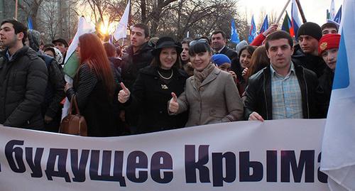 Paricipants of the rally on the anniversary of the Crimea joining Russia. March 18, 2015. Photo by Patimat Makhmudova for the "Caucasian Knot" Paricipants of the rally on the anniversary of the Crimea joining Russia. March 18, 2015. Photo by Patimat Makhmudova for the "Caucasian Knot"