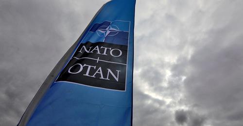 The NATO flag. Photo: REUTERS/Reinhard Krause The NATO flag. Photo: REUTERS/Reinhard Krause