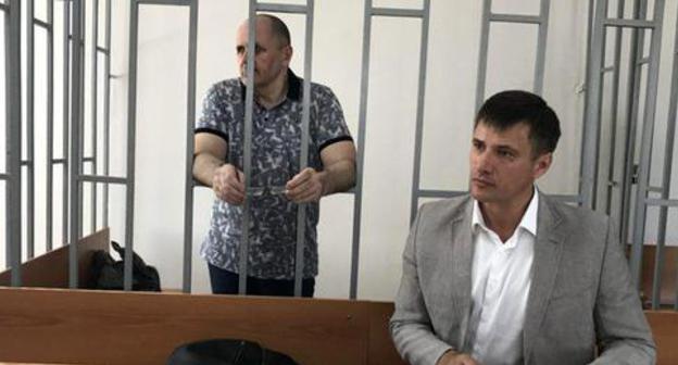 Oyub Titiev and his advocate Pyotr Zaikin (right) in the court. Photo: press service of HRC 'Memorial' Oyub Titiev and his advocate Pyotr Zaikin (right) in the court. Photo: press service of HRC 'Memorial'