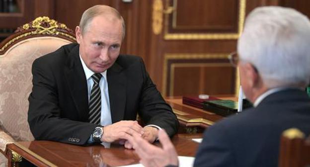 Vladimir Putin meets acting leader of Dagestan Vladimir Vasiliev. Photo: http://kremlin.ru/events/president/news/57975 Vladimir Putin meets acting leader of Dagestan Vladimir Vasiliev. Photo: http://kremlin.ru/events/president/news/57975