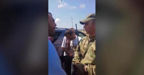 Russian serviceman talks to residents of Panik village, July 18, 2018. Screenshot from video: https://www.facebook.com/100002121814208/videos/vb.100002121814208/1770571256356918/?type=2&video_source=user_video_tab Russian serviceman talks to residents of Panik village, July 18, 2018. Screenshot from video: https://www.facebook.com/100002121814208/videos/vb.100002121814208/1770571256356918/?type=2&video_source=user_video_tab