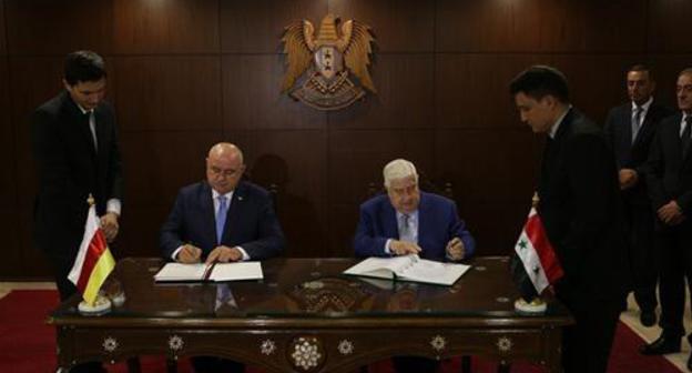 The Ministers of Foreign Affairs for South Ossetia and Syria Dmitry Medoyev and Walid Muallem, respectively. Photo by the press service of the Ministry of Foreign Affairs for South Ossetia http://www.mfa-rso.su/ The Ministers of Foreign Affairs for South Ossetia and Syria Dmitry Medoyev and Walid Muallem, respectively. Photo by the press service of the Ministry of Foreign Affairs for South Ossetia http://www.mfa-rso.su/