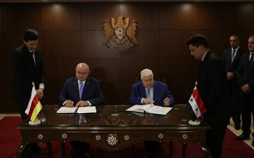The Ministers of Foreign Affairs for South Ossetia and Syria Dmitry Medoyev and Walid Muallem, respectively. Photo by the press service of the Ministry of Foreign Affairs for South Ossetia http://www.mfa-rso.su/ The Ministers of Foreign Affairs for South Ossetia and Syria Dmitry Medoyev and Walid Muallem, respectively. Photo by the press service of the Ministry of Foreign Affairs for South Ossetia http://www.mfa-rso.su/