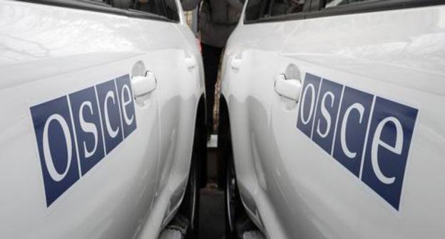 OSCE cars. Photo: REUTERS/Gleb Garanich OSCE cars. Photo: REUTERS/Gleb Garanich
