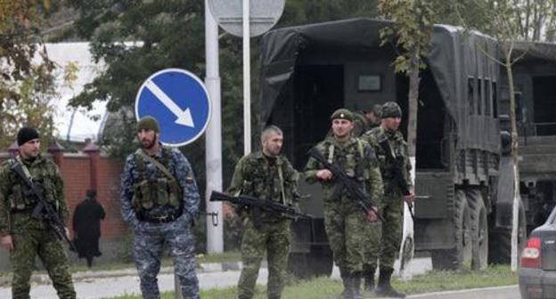 Law enforcers. Photo: REUTERS/Alkhan Gargayev Law enforcers. Photo: REUTERS/Alkhan Gargayev