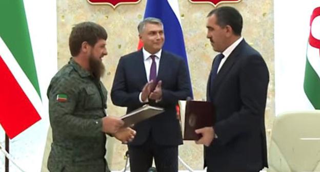 Ramzan Kadyrov and Yunus-Bek Evkurov during signing an agreement. Photo: screenshot of the video https://www.youtube.com/watch?time_continue=71&v=rw9gKK48HFY Ramzan Kadyrov and Yunus-Bek Evkurov during signing an agreement. Photo: screenshot of the video https://www.youtube.com/watch?time_continue=71&v=rw9gKK48HFY