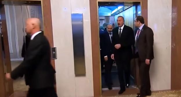 The Armenian Prime Minister (on the left) and the President of Ilham Aliev leaving the elevator at the summit of the CIS countries. For more: https://ru.armeniasputnik.am/video/20181001/14803584/vstrecha-pashinyana-alieva-lifte-sensacionnye-kadry.html Photo: screenshot of a video with a fragment of the TV program "Moscow. Kremlin. Putin", 30.09.18 https://www.youtube.com/watch?time_continue=4&v=SUHYx0EmRWA The Armenian Prime Minister (on the left) and the President of Ilham Aliev leaving the elevator at the summit of the CIS countries. For more: https://ru.armeniasputnik.am/video/20181001/14803584/vstrecha-pashinyana-alieva-lifte-sensacionnye-kadry.html Photo: screenshot of a video with a fragment of the TV program "Moscow. Kremlin. Putin", 30.09.18 https://www.youtube.com/watch?time_continue=4&v=SUHYx0EmRWA