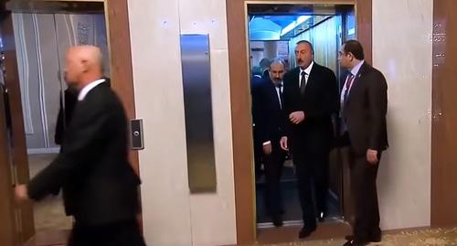 The Armenian Prime Minister (on the left) and the President of Ilham Aliev leaving the elevator at the summit of the CIS countries. For more: https://ru.armeniasputnik.am/video/20181001/14803584/vstrecha-pashinyana-alieva-lifte-sensacionnye-kadry.html Photo: screenshot of a video with a fragment of the TV program "Moscow. Kremlin. Putin", 30.09.18 https://www.youtube.com/watch?time_continue=4&v=SUHYx0EmRWA The Armenian Prime Minister (on the left) and the President of Ilham Aliev leaving the elevator at the summit of the CIS countries. For more: https://ru.armeniasputnik.am/video/20181001/14803584/vstrecha-pashinyana-alieva-lifte-sensacionnye-kadry.html Photo: screenshot of a video with a fragment of the TV program "Moscow. Kremlin. Putin", 30.09.18 https://www.youtube.com/watch?time_continue=4&v=SUHYx0EmRWA