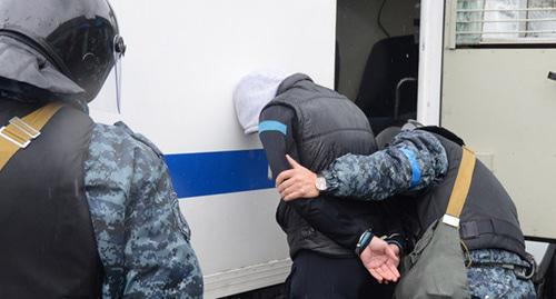 Law enforcers during detention. Photo by the press service of the Russian National Anti-Terrorism Committee http://nac.gov.ru/ Law enforcers during detention. Photo by the press service of the Russian National Anti-Terrorism Committee http://nac.gov.ru/