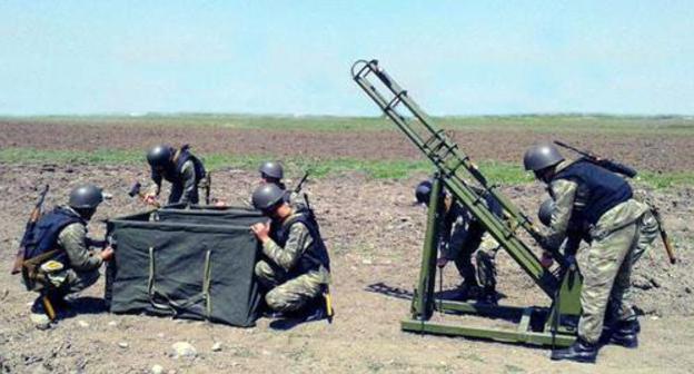 Azerbaijani soldiers, April 2018. Photo: press service of the Ministry of Defence of Azerbaijan, https://mod.gov.az/ru/news/provedeno-sorevnovanie-za-zvanie-luchshego-inzhenerno-sapernogo-otdeleniya-voinskogo-obedineniya-22462.html Azerbaijani soldiers, April 2018. Photo: press service of the Ministry of Defence of Azerbaijan, https://mod.gov.az/ru/news/provedeno-sorevnovanie-za-zvanie-luchshego-inzhenerno-sapernogo-otdeleniya-voinskogo-obedineniya-22462.html