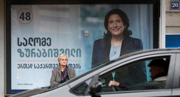 Election campaign poster with Salome Zurabishvili's portrait in Tbilisi, October 2018. Photo: REUTERS/David Mdzinarishvili Election campaign poster with Salome Zurabishvili's portrait in Tbilisi, October 2018. Photo: REUTERS/David Mdzinarishvili