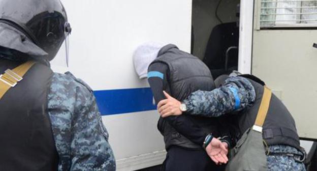Law enforcers during detention. Photo by the press service of Russia's National Anti-Terrorism Committee http://nac.gov.ru/ Law enforcers during detention. Photo by the press service of Russia's National Anti-Terrorism Committee http://nac.gov.ru/