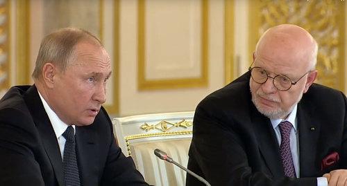 Vladimir Putin (on the left) and Mikhail Fedotov at the session of the Human Rights Council http://president-sovet.ru/presscenter/news/read/5119/ Vladimir Putin (on the left) and Mikhail Fedotov at the session of the Human Rights Council http://president-sovet.ru/presscenter/news/read/5119/