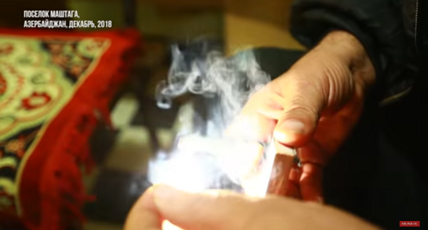 The ritual of a "removal of fear by fire" (chyldag) is a popular medical rite in Azerbaijan. Screenshot of the video by Meydan TV The ritual of a "removal of fear by fire" (chyldag) is a popular medical rite in Azerbaijan. Screenshot of the video by Meydan TV