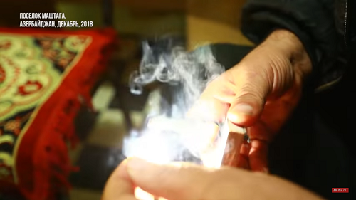 The ritual of a "removal of fear by fire" (chyldag) is a popular medical rite in Azerbaijan. Screenshot of the video by Meydan TV The ritual of a "removal of fear by fire" (chyldag) is a popular medical rite in Azerbaijan. Screenshot of the video by Meydan TV