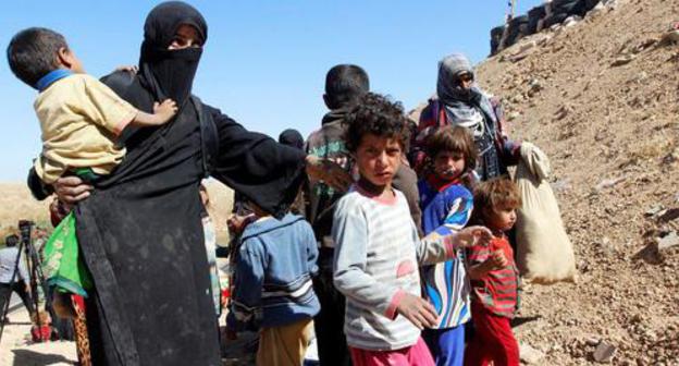 Woman with children, Kirkuk, Iraq, October 4, 2017. Photo: REUTERS/АКО Рашид Woman with children, Kirkuk, Iraq, October 4, 2017. Photo: REUTERS/АКО Рашид