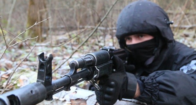 A law enforcer. Photo by the press service of the Russian National Antiterrorist Committee (NAC) http://nac.gov.ru A law enforcer. Photo by the press service of the Russian National Antiterrorist Committee (NAC) http://nac.gov.ru