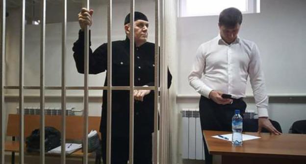 Oyub Titiev listens to the verdict. Photo by Dmitry Borko, HRC "Memorial" Oyub Titiev listens to the verdict. Photo by Dmitry Borko, HRC "Memorial"