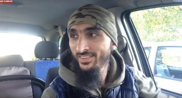 Tumso Abdurakhmanov. Screenshot from video 'Registration in Poland | Compare it with Russia' ABU-SADDAM SHISHANI, https://www.youtube.com/watch?v=B8DMZBYQatI Tumso Abdurakhmanov. Screenshot from video 'Registration in Poland | Compare it with Russia' ABU-SADDAM SHISHANI, https://www.youtube.com/watch?v=B8DMZBYQatI