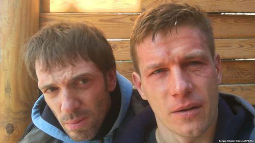 Andrei Kostyanov and Sergey Khazov-Kassia after being attacked. Photo: RFE/RL Andrei Kostyanov and Sergey Khazov-Kassia after being attacked. Photo: RFE/RL