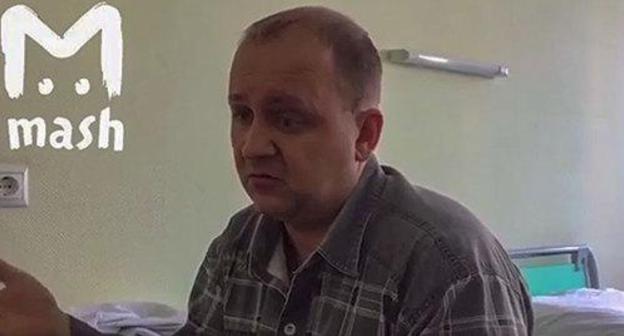 Roman Romenkov, a victim of the road accident. Screenshot from video posted by STRINGERS at https://www.youtube.com/watch?v=7TaTcrUqppA Roman Romenkov, a victim of the road accident. Screenshot from video posted by STRINGERS at https://www.youtube.com/watch?v=7TaTcrUqppA