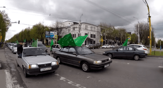 A motor rally with the Adyg flags held in Nalchik. Screenshot of the video by Sergei Chernov "The Circassian Flag Day". Nalchik, April 25, 2017 https://www.youtube.com/watch?v=1wo_48hgN3U A motor rally with the Adyg flags held in Nalchik. Screenshot of the video by Sergei Chernov "The Circassian Flag Day". Nalchik, April 25, 2017 https://www.youtube.com/watch?v=1wo_48hgN3U