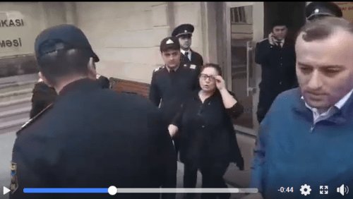 Shafag Agabalaeva, a journalist, leaves the court on May 3, 2019. Screenshot of the video https://www.facebook.com/shefeq.agacan/posts/1038020389919082 Shafag Agabalaeva, a journalist, leaves the court on May 3, 2019. Screenshot of the video https://www.facebook.com/shefeq.agacan/posts/1038020389919082