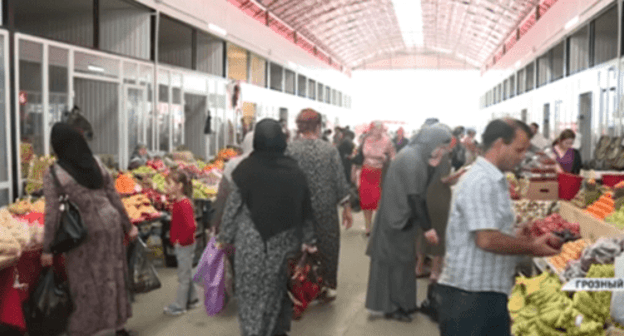 Residents of Grozny at food market. Screeshot from video reportage by 'Grozny' TV Channel, https://www.youtube.com/watch?v=W39ZdVcGX0I Residents of Grozny at food market. Screeshot from video reportage by 'Grozny' TV Channel, https://www.youtube.com/watch?v=W39ZdVcGX0I