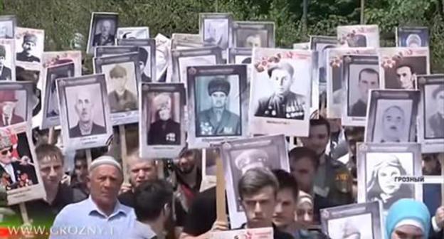Participants of the "Immortal Regiment" action in Grozny, May 9, 2019. Screenshot from video broadcasting by 'Grozny' TV Channel, https://www.youtube.com/watch?v=3pjVOi_3Bjo Participants of the "Immortal Regiment" action in Grozny, May 9, 2019. Screenshot from video broadcasting by 'Grozny' TV Channel, https://www.youtube.com/watch?v=3pjVOi_3Bjo