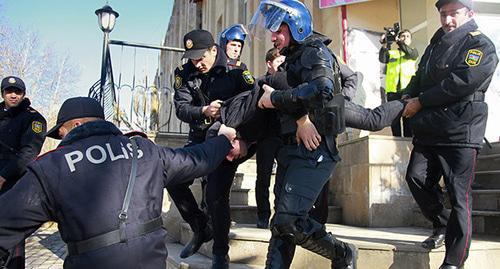 The police in Azerbaijan detains an activist. Photo: REUTERS/Aziz Karimov The police in Azerbaijan detains an activist. Photo: REUTERS/Aziz Karimov