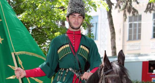 Participants of equestrian march cross central Nalchik. Photo by Lyudmila Maratova for the Caucasian Knot Participants of equestrian march cross central Nalchik. Photo by Lyudmila Maratova for the Caucasian Knot