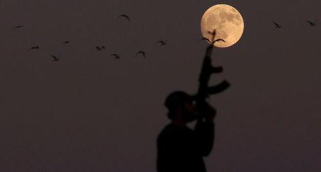 An armed man. Photo: REUTERS/Alaa al-Faqir An armed man. Photo: REUTERS/Alaa al-Faqir