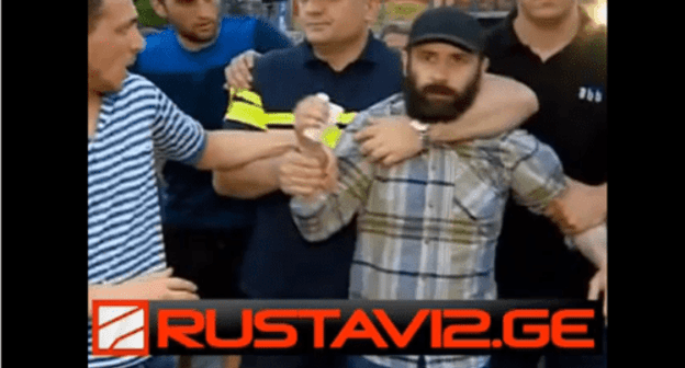 Screenshot of the video of the detention of a gay parade opponent in Tbilisi. June 14, 2019. Screenshot of the video by Rustavi 2 http://www.rustavi2.ge/en/news/135982 Screenshot of the video of the detention of a gay parade opponent in Tbilisi. June 14, 2019. Screenshot of the video by Rustavi 2 http://www.rustavi2.ge/en/news/135982